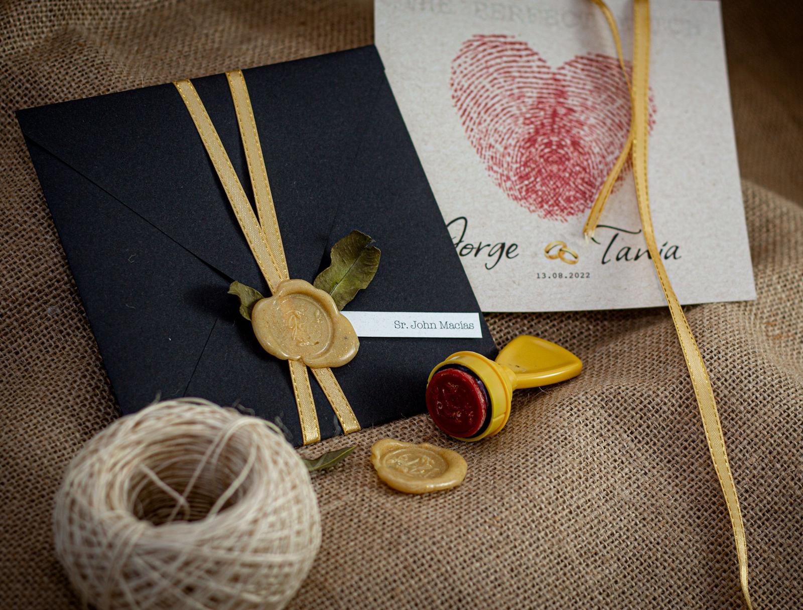 Sealed wedding invitation envelope showing a single guest name and title on a printed label